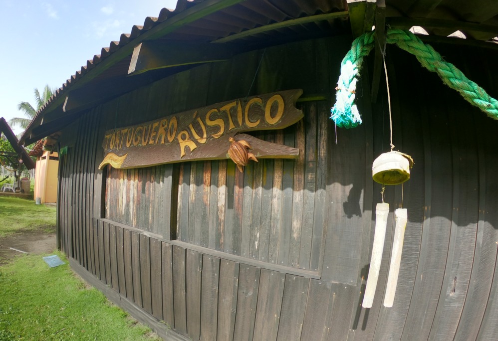 Our wodden Tortuguero Rústico sign hangs in front of the dinning area.